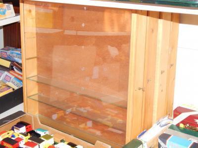 Four pine model car wall mounted display cases.