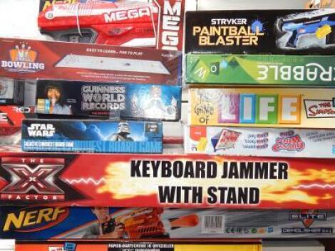 An X Factor keyboard jammer with stand