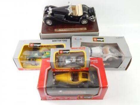 Five Burago die cast vehicles