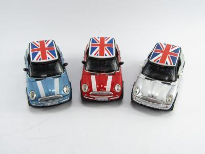 Three die cast models of Mini Coopers