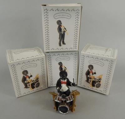 Four modern Let The Music Play bandsmen figures. (4