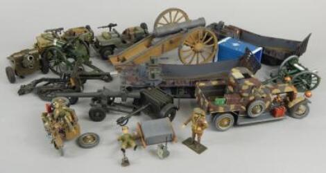 A collection of die-cast metal and other military vehicles