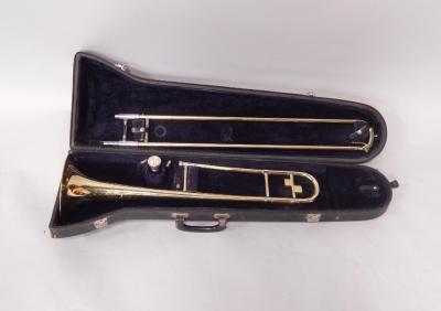 A Frank Holton & Co Collegiate brass and plated trombone