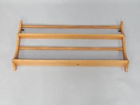 An Ercol oak two tier plate rack