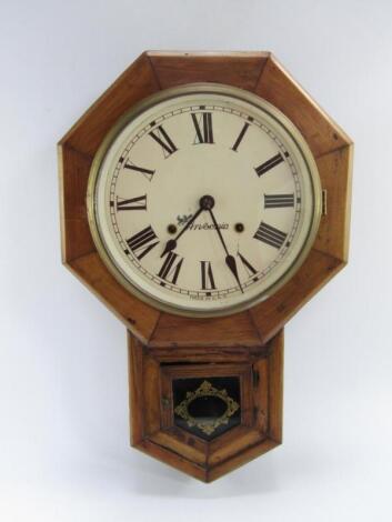 An Ansonia walnut and oak drop dial wall clock