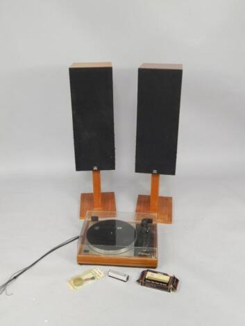 A pair of Monitor Audio teak cased speakers