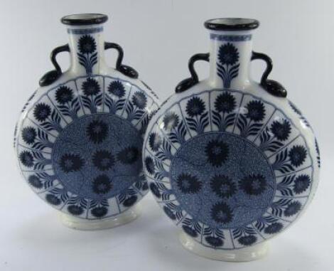 A pair of Minton late 19thC blue and white pottery moon flask vase