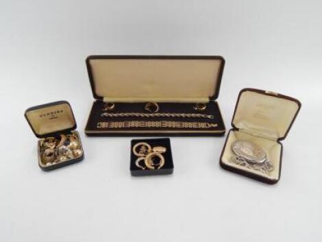 Two pairs of 9ct gold hoop earrings and a 9ct gold photo locket on chain