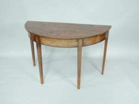 A George III mahogany demi lune side table