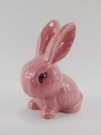 A Sylvac pink glazed seated rabbit