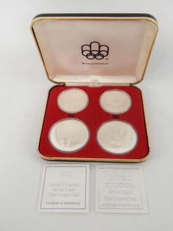 A cased set of silver Olympic commemorative coins