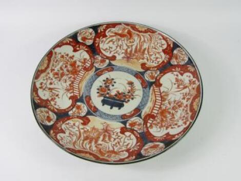 A Japanese Meiji period porcelain Imari charger