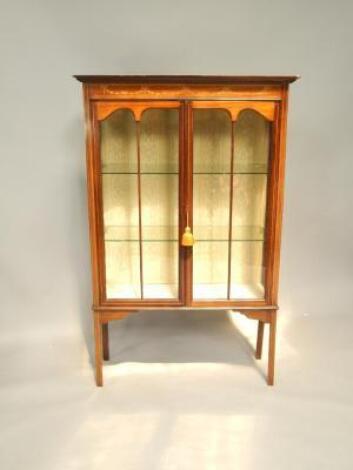 An Edwardian mahogany and satinwood inlaid display cabinet