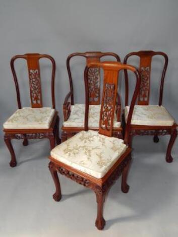 A set of eight Chinese hardwood dining chairs