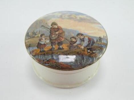 A Prattware pot lid decorated with cockle gathering and fishing