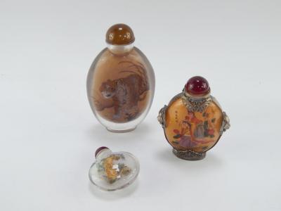 Three Chinese inside decorated glass snuff bottles