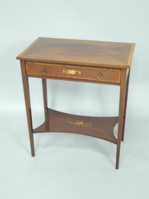 A mahogany and inlaid side table