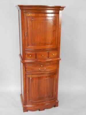 A walnut and brass bow fronted cocktail cabinet