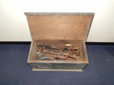 A tool chest containing planes