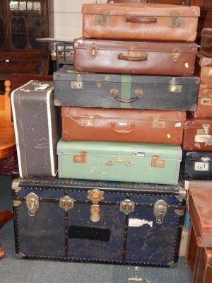 A blue metal cabin trunk