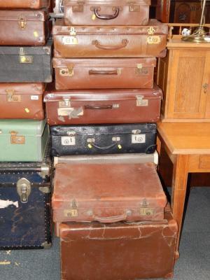 Leather morocco and canvas suitcases