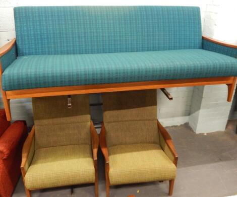 A retro style G Plan type teak three piece suite