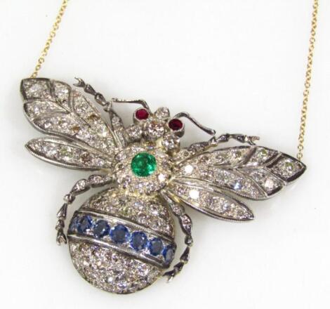 An 18ct gold diamond sapphire emerald and ruby bee shaped pendant necklace