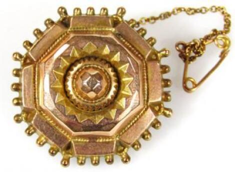 An enclosed brooch