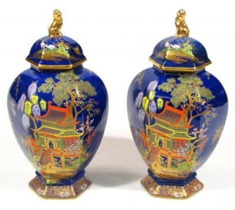 A pair of 20thC Carltonware Bleu Royale Mikado pattern hexagonal jars and cover