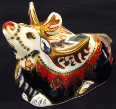 A Royal Crown Derby paperweight figure