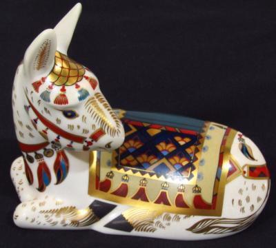 A Royal Crown Derby paperweight figure