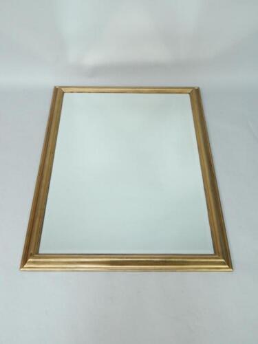 A rectangular giltwood wall mirror