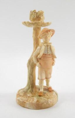 A Hadleys Worcester blush porcelain figural candlestick