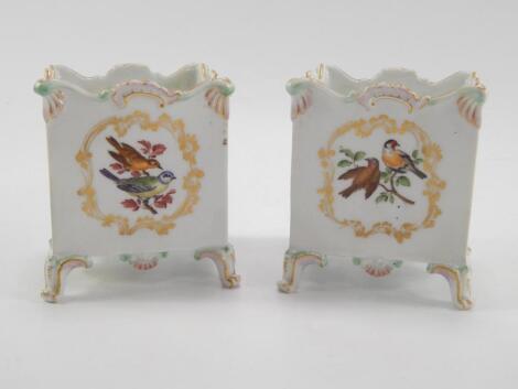 A pair of Meissen late 19thC porcelain cache pots