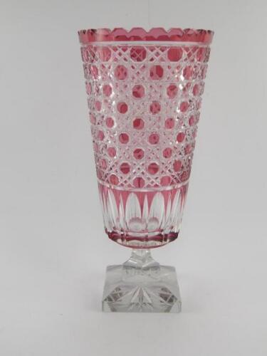 A Continental cranberry flashed cut glass vase