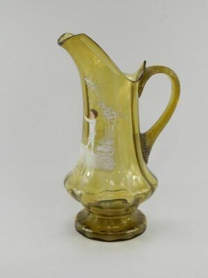 A Mary Gregory late 19thC green glass water jug