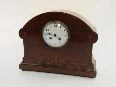 An Edwardian mahogany and inlaid mantel clock