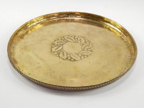 A Hugh Wallis brass circular tray