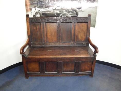 An 18thC oak settle