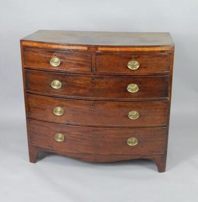 A George III mahogany bow front chest of drawers