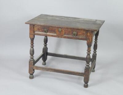 A Victorian oak Carolean style side table