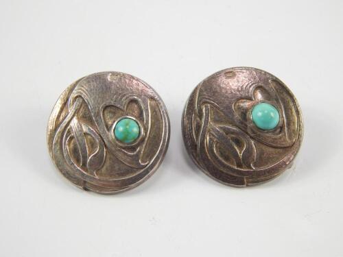 A pair of Liberty Cymric silver and turquoise buttons converted to cufflinks