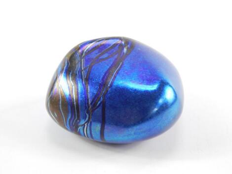 A Siddy Langley blue iridescent pebble form paperweight