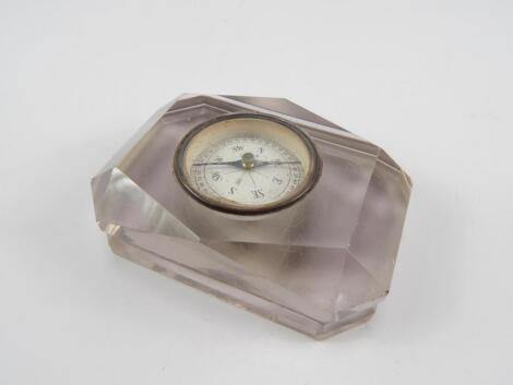A Victorian faceted cut glass paperweight