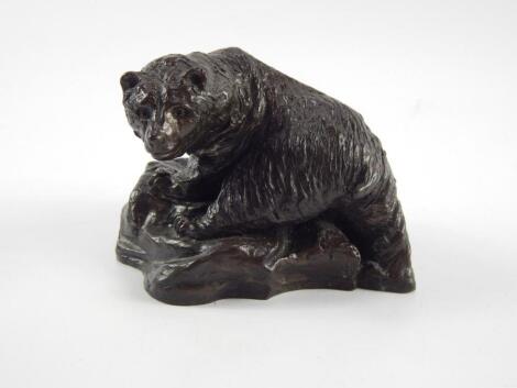 A bronze figure of a bear