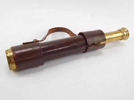 A Broadhurst Clarkson & Co Ltd brass and leather bound four draw telescope, 83cm long fully extended.