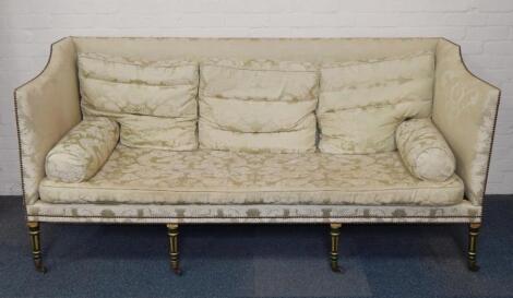 A Hepplewhite period three seater sofa