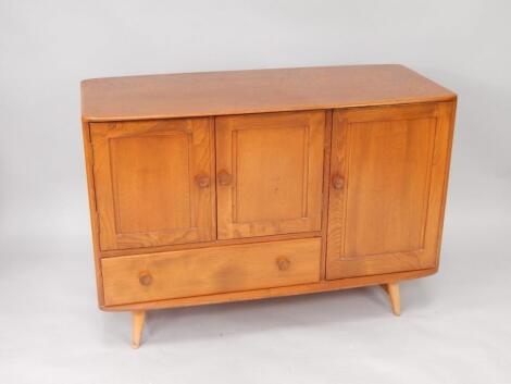 An Ercol elm sideboard