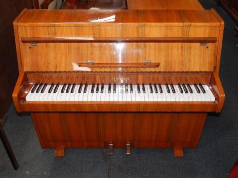 A Zander walnut cased upright piano