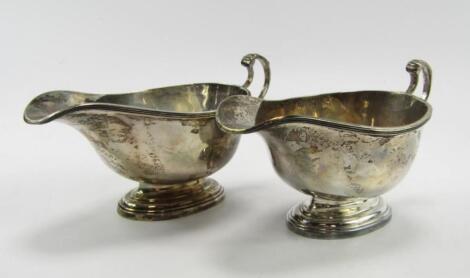 A pair of George V silver sauce boats